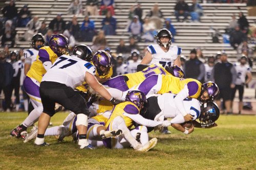 The Tigers' defense swarms Frontier's offense. 